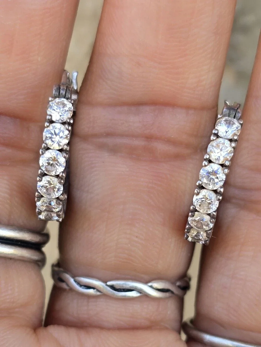Elegant channel set sparkling CZ diamonds half filigree hoop earrings